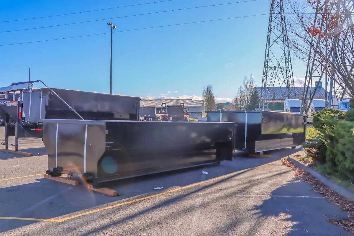 Roll-off dumpster ready for waste disposal at job site for 8 Yard Dumpster Rental in Bondurant